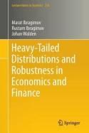 Heavy-Tailed Distributions and Robustness in Economics and Finance